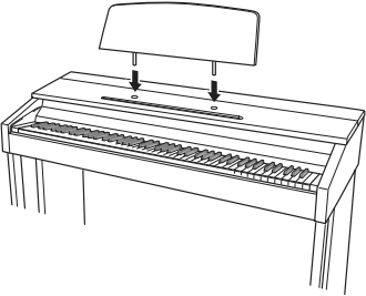 Install the music stand by inserting its pegs into the holes in the top of the piano